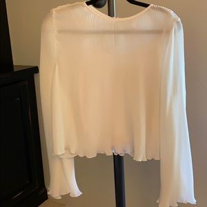 Fine pleated cream blouse